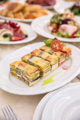 Food Table Celebration Delicious Party Meal Concept. A lot of food. Served for wedding, anniversary, other holiday. Banquet dishes in the restaurant