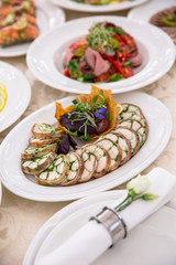 Food Table Celebration Delicious Party Meal Concept. A lot of food. Served for wedding, anniversary, other holiday. Banquet dishes in the restaurant