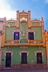 Green House in the street of Figueras, Catalonia, Spain