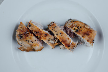 fried tuna fillet on white plate