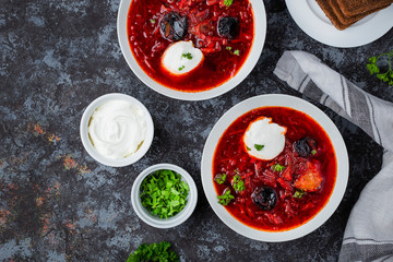 Traditional borscht with prunes and sour cream