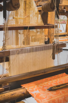 Retro hand loom with jacquard harness.