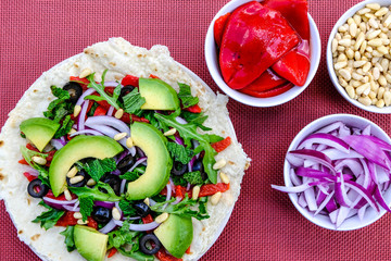 Healthy Vegetarian Avocado Salad on a Pizza Base