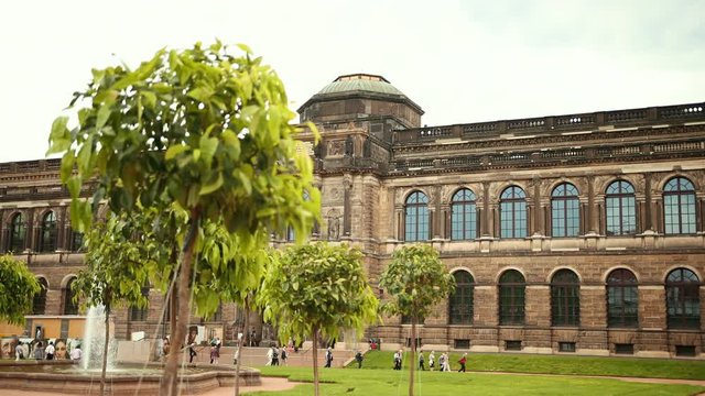 Ronin shot of famous Zwinger palace (Der Dresdner Zwinger) Art Gallery of Dresden. Colorful spring scene in Dresden, Saxony, Germany, Europe. 4k video. Wide angle, prores, slow motion