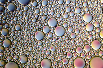blue texture of soap bubbles on water