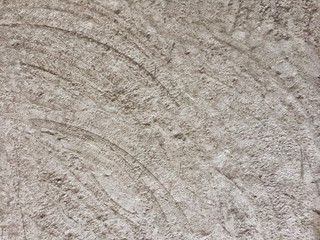 cement floor, with patterns similar to waves, background texture for designers, concrete wallpaper