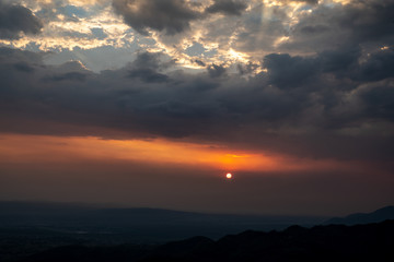 Fototapeta na wymiar sunsets light up sky in Rishikesh