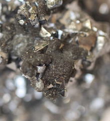 Natural raw mineral,in its structure has many small flat surfaces
