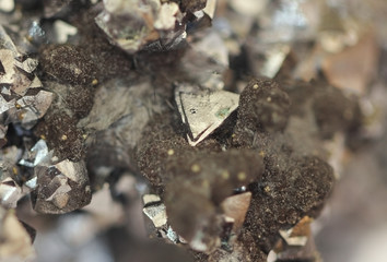 Natural raw mineral,in its structure has many small flat surfaces