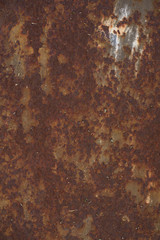 Strongly worn iron rusty wall from a large garage