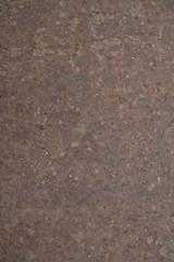 Strongly worn iron rusty wall from a large garage