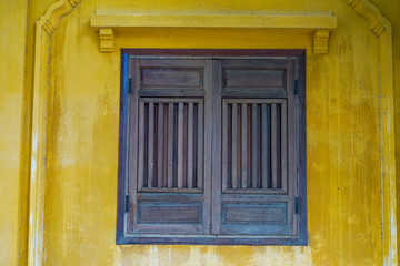 window with wooden shutters