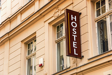 Obraz premium Hostel letters street sign