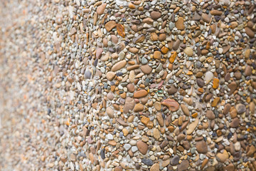 Texture of small white cobble stone. Part sharp and fuzzy. Copyspace, place for text