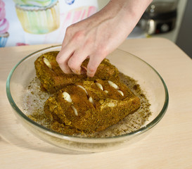 Female cook cooks delicious pastrami