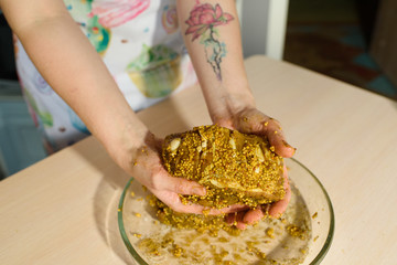 Female cook cooks delicious pastrami
