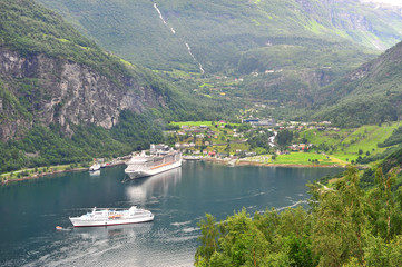 Nautical vessels in port of Geiranger fjord