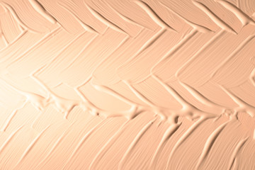 Liquid foundation texture. Make up for women. Top view.