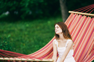 beautiful woman on green leaves park nature