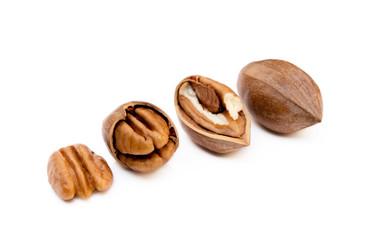 Fresh pecan nuts isolated on a white background