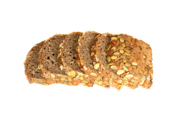 Healthy sliced bread with pumpkin seed isolated on a white background. Bread slices and crumbs viewed from above. Top view