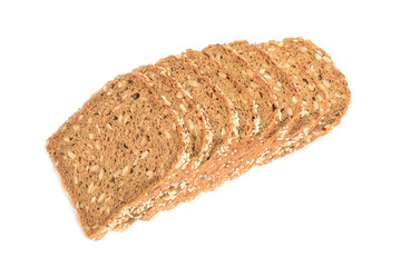 Loaf of fresh sliced multigrain gluten free bread with sesame, flax seeds, isolated on white.