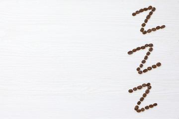 Alphabet Zzz laid out of grains symbolizing sleep on structural white wooden background, on right side