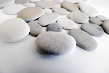 Round Gray Stones isolated on a White Background