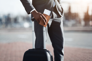 Businessman Holding Passport With Tickets, Waiting for Departure