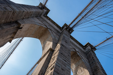 Close up view of Brooklyn Bridge in summer sunny daylight