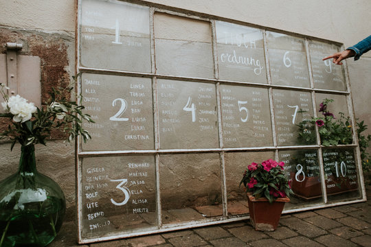 wall with table numbers on a wedding