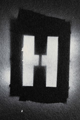 Letter H grunge spray paninted stencil font
