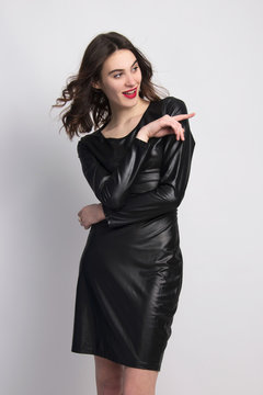 little black dress  beautiful fashion model posing isolated in studio