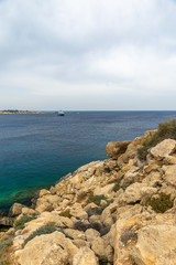 Fototapeta na wymiar Transparent water along the azure coast of the Mediterranean Sea.
