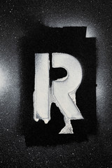 Letter R grunge spray paninted stencil font