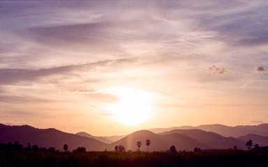 Silhouette vintage of nature mountain and sunset sky in sky background