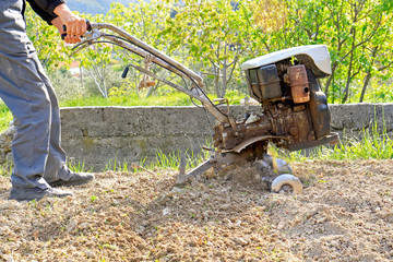 Fototapeta premium Plowing the earth