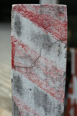 flag painted on red and white brick wall