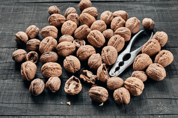 Walnuts on black table