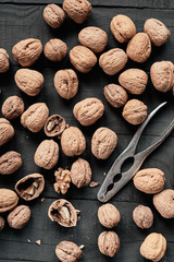 Walnuts on black table