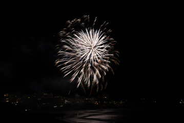 Firework celebrating Bastille Day in Biarritz city. Basque Country of France.