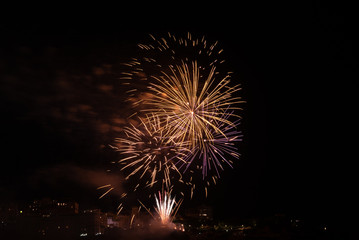 Fototapeta na wymiar Firework celebrating Bastille Day in Biarritz city. Basque Country of France.