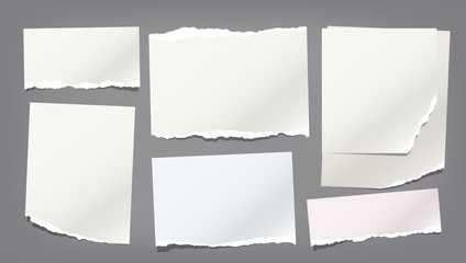 Ripped, torn note, notebook paper strips, copybook sheet stuck on dark grey background. Vector illustration