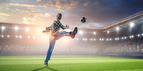 Fototapeta na wymiar Black man plays his best soccer match