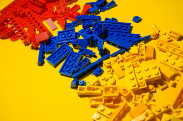 blue red and yellow toy bricks