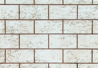 Fototapeta premium Wall of gray artificial stone as background