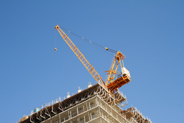 Construction Scene - Crane on Blue Sky 