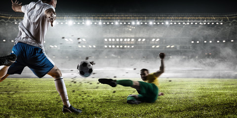 Obraz na płótnie Canvas Soccer players in action on a stadium