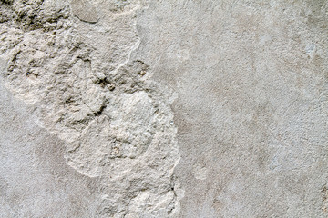 Plastered gray concrete wall as background