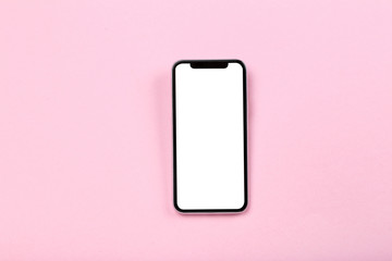 Smartphone on pink background
